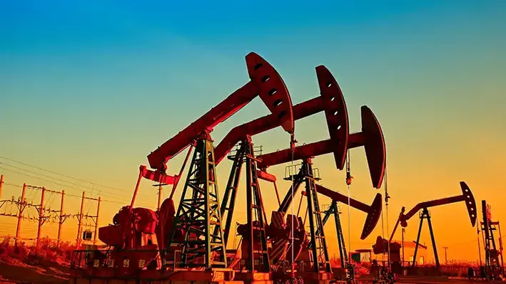 onshore_oil_pumps_sunset_silhouette